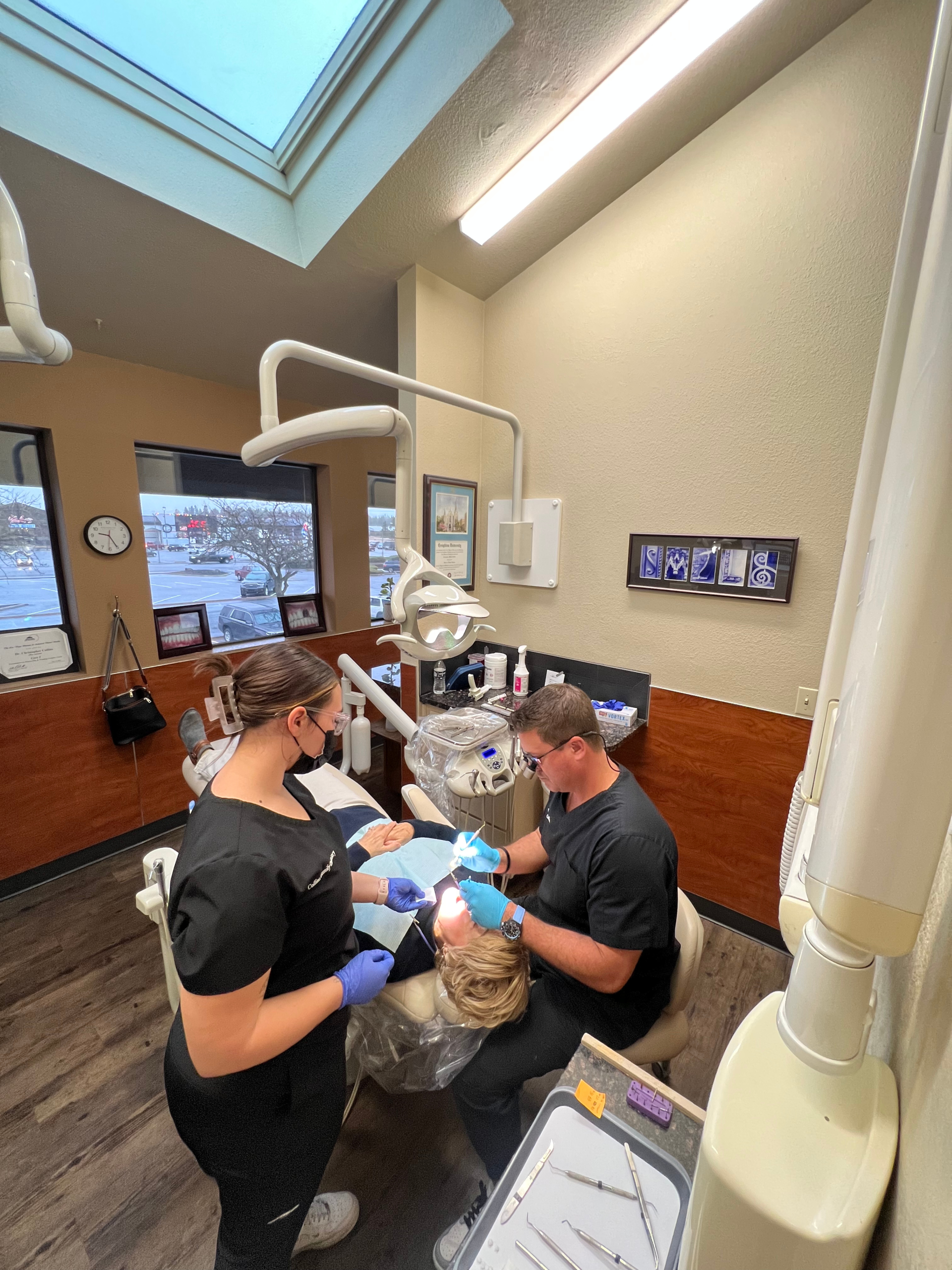 The Collins Family Dentistry team caring for a patient